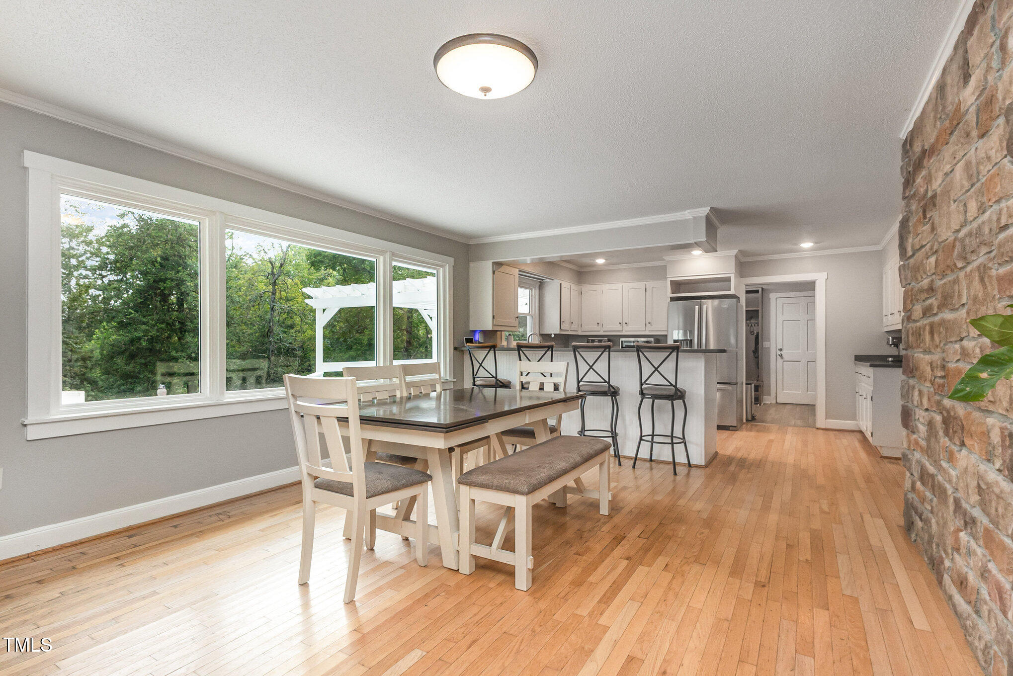 2215 Southern Road Sanford, NC 27330 - Photo 14 of 68 a view of a dining room with furniture window and wooden floor