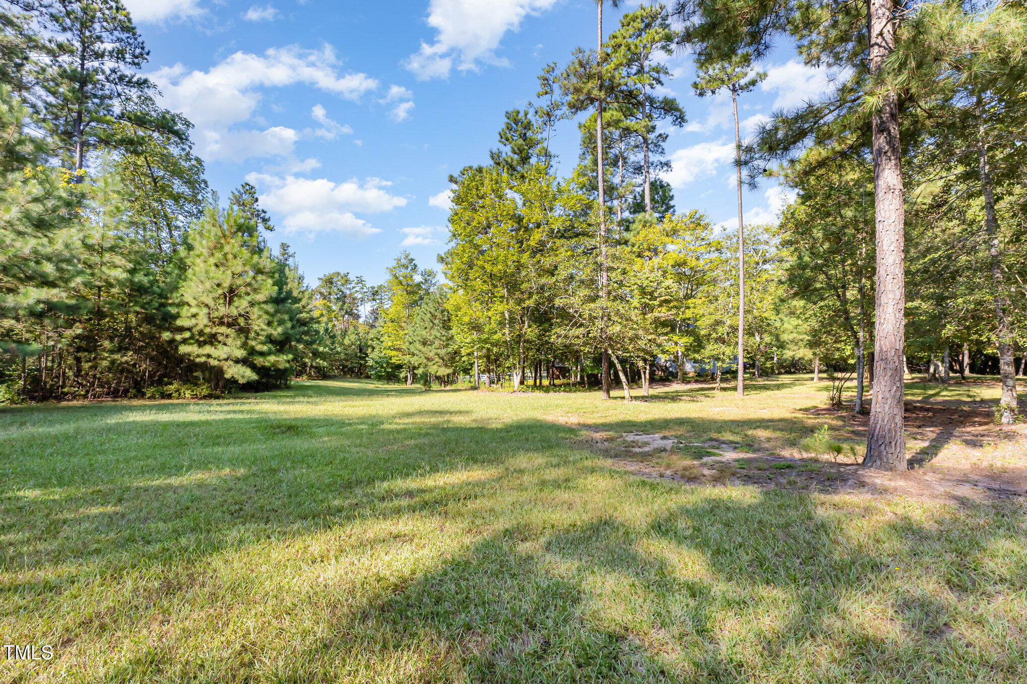 2215 Southern Road Sanford, NC 27330 - Photo 62 of 68 a view of grassy field with trees