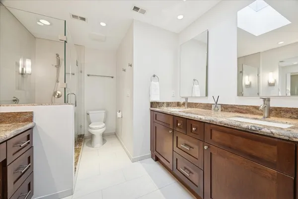 a view of an empty room and outdoor shower