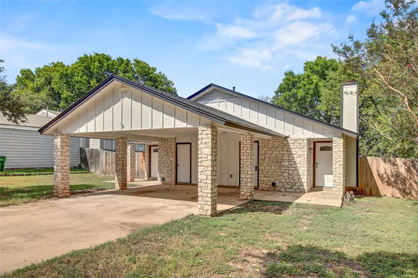 a front view of a house with a porch