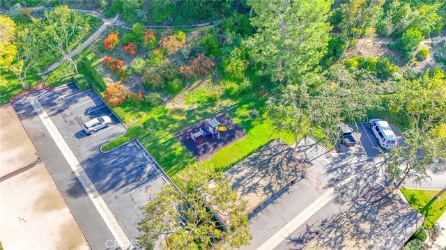 an aerial view of residential houses and outdoor space