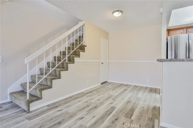 a view of entryway with wooden floor