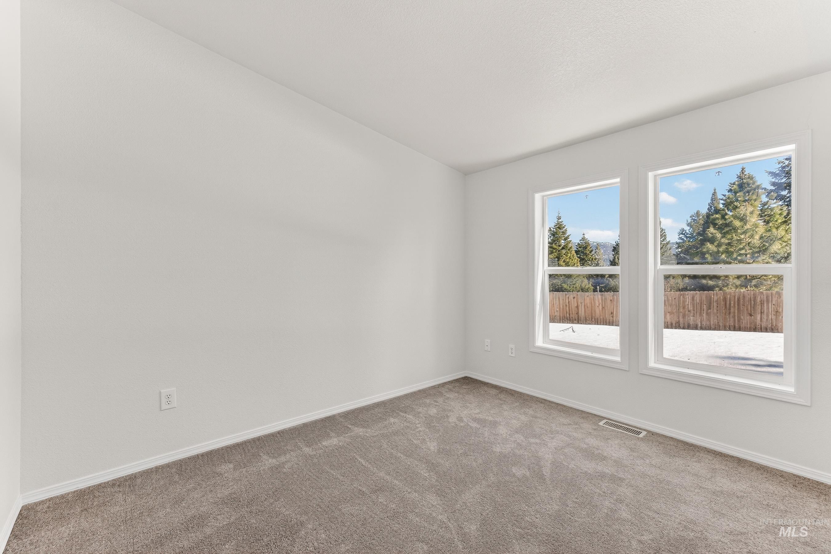1649 Crown Point Parkway Cascade, ID 83611 - Photo 19 of 24 Neutral-toned carpeting covering the floor
