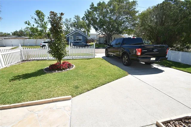 a house view with a garden space