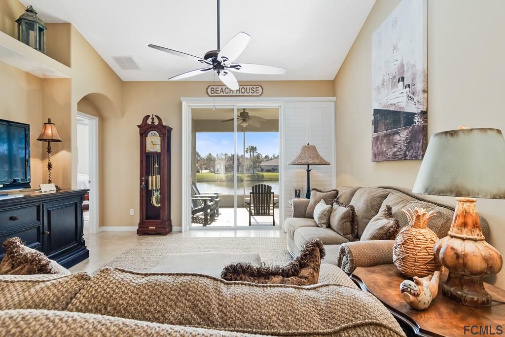 55 Raintree Circle Palm Coast, FL 32164 - Photo 12 of 62 Living to patio/waterview