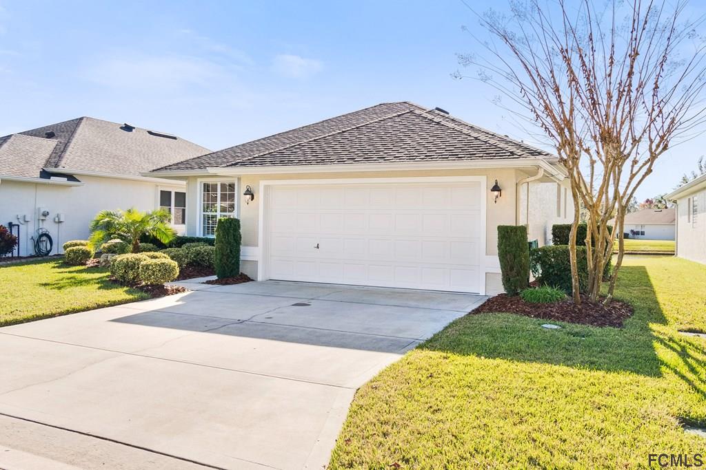 55 Raintree Circle Palm Coast, FL 32164 - Photo 3 of 62 Roomy 2 car garage