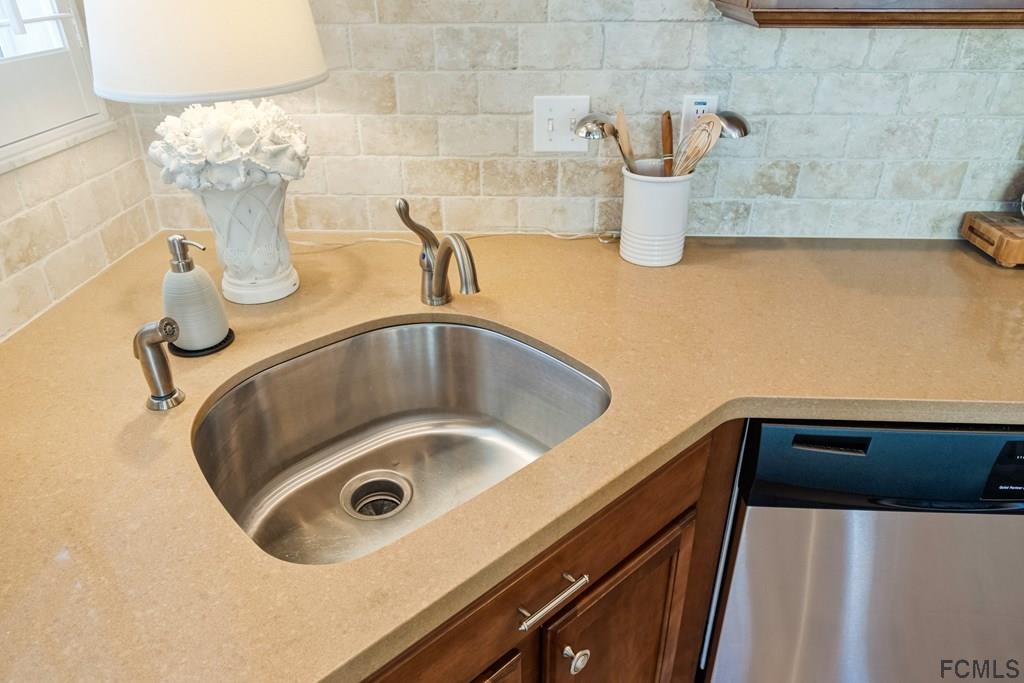55 Raintree Circle Palm Coast, FL 32164 - Photo 24 of 62 Beautiful backsplash and deep bowl sink