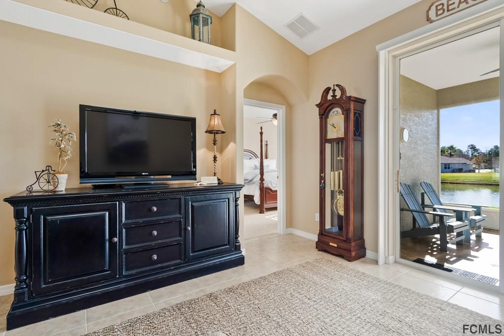 55 Raintree Circle Palm Coast, FL 32164 - Photo 26 of 62 Living overlooking lake