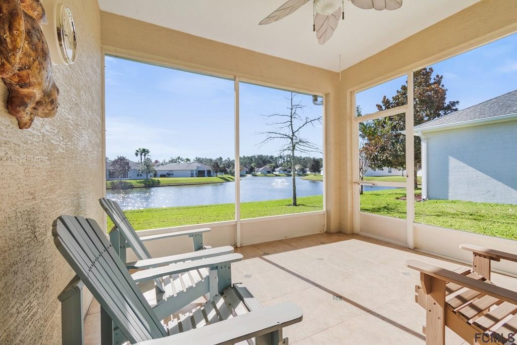 55 Raintree Circle Palm Coast, FL 32164 - Photo 44 of 62 Screened/covered patio overlooking water