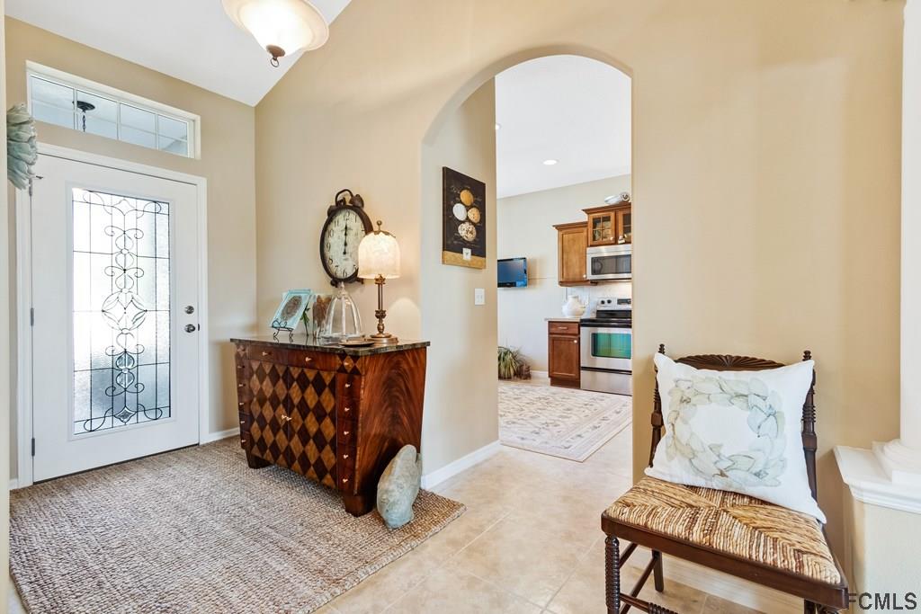 55 Raintree Circle Palm Coast, FL 32164 - Photo 8 of 62 Left off the entry hallway into the kitchen