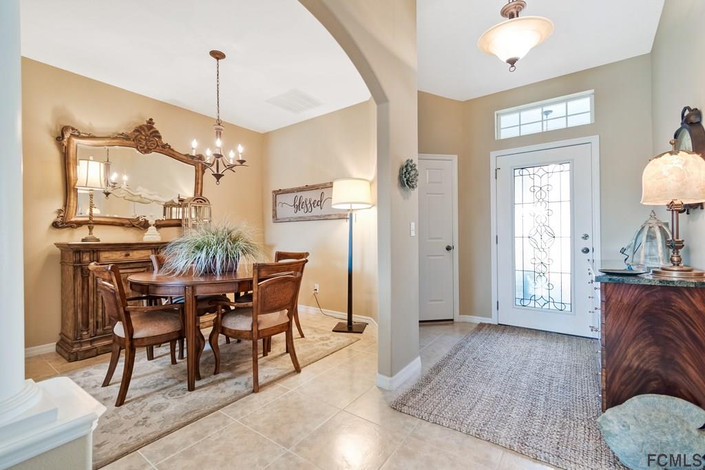 55 Raintree Circle Palm Coast, FL 32164 - Photo 9 of 62 Right of entry hallway, ample dining room