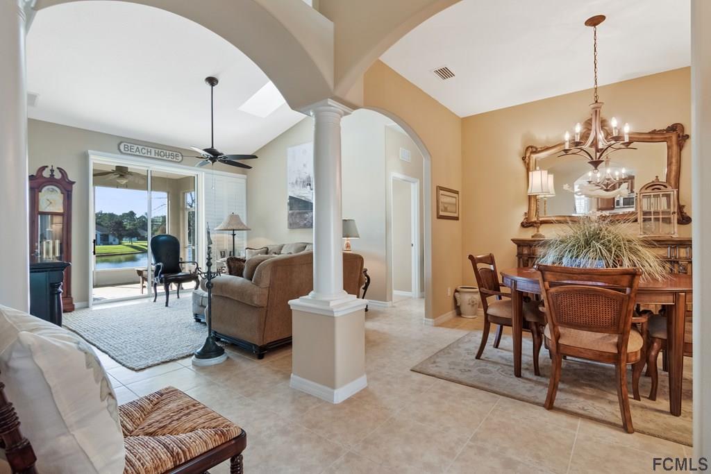 55 Raintree Circle Palm Coast, FL 32164 - Photo 10 of 62 Great room with pillar added for definition of spa