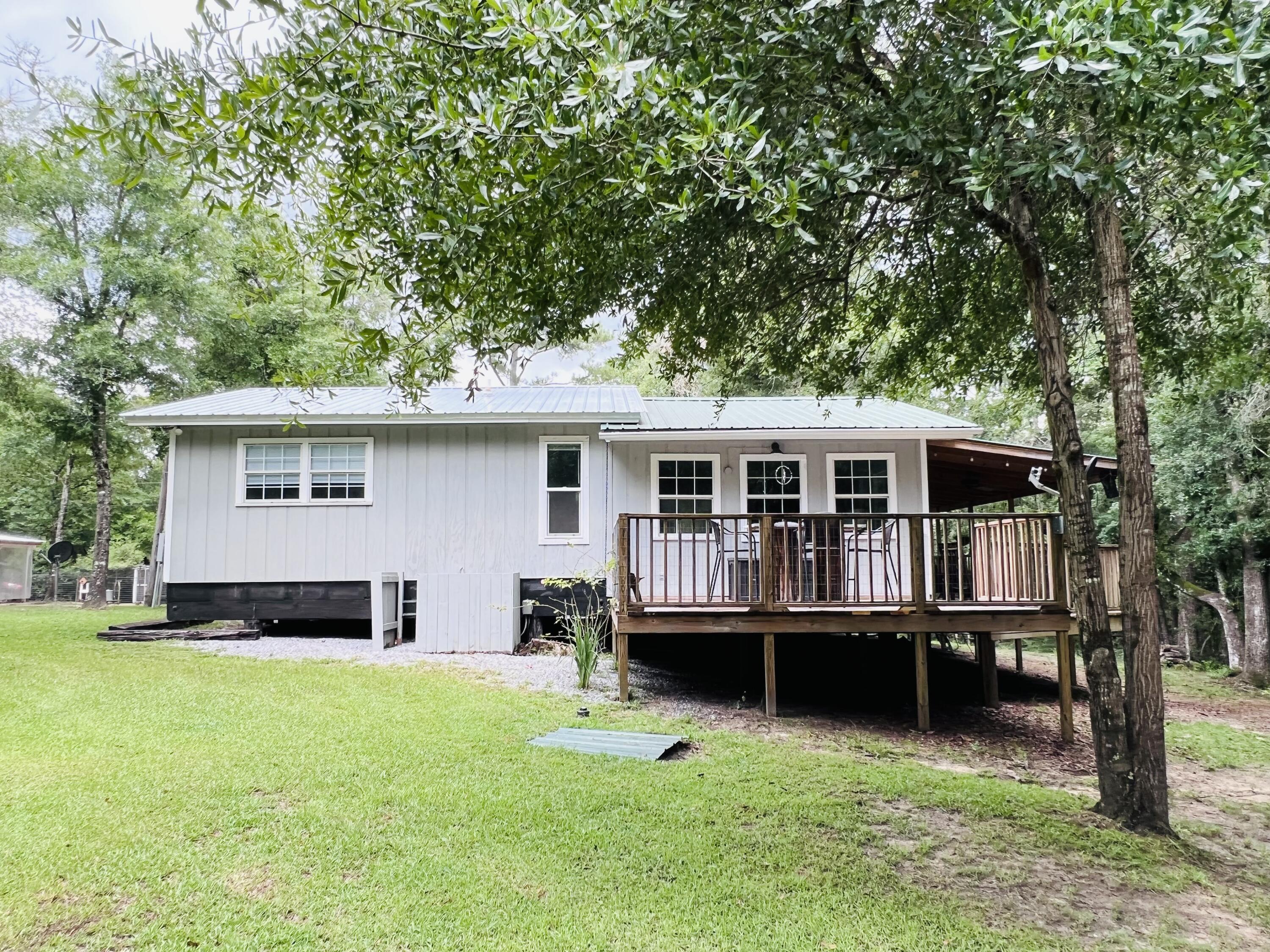 Xxxx Kervin Road Crestview, FL 32539 - Photo 33 of 78 front view of a house with a yard