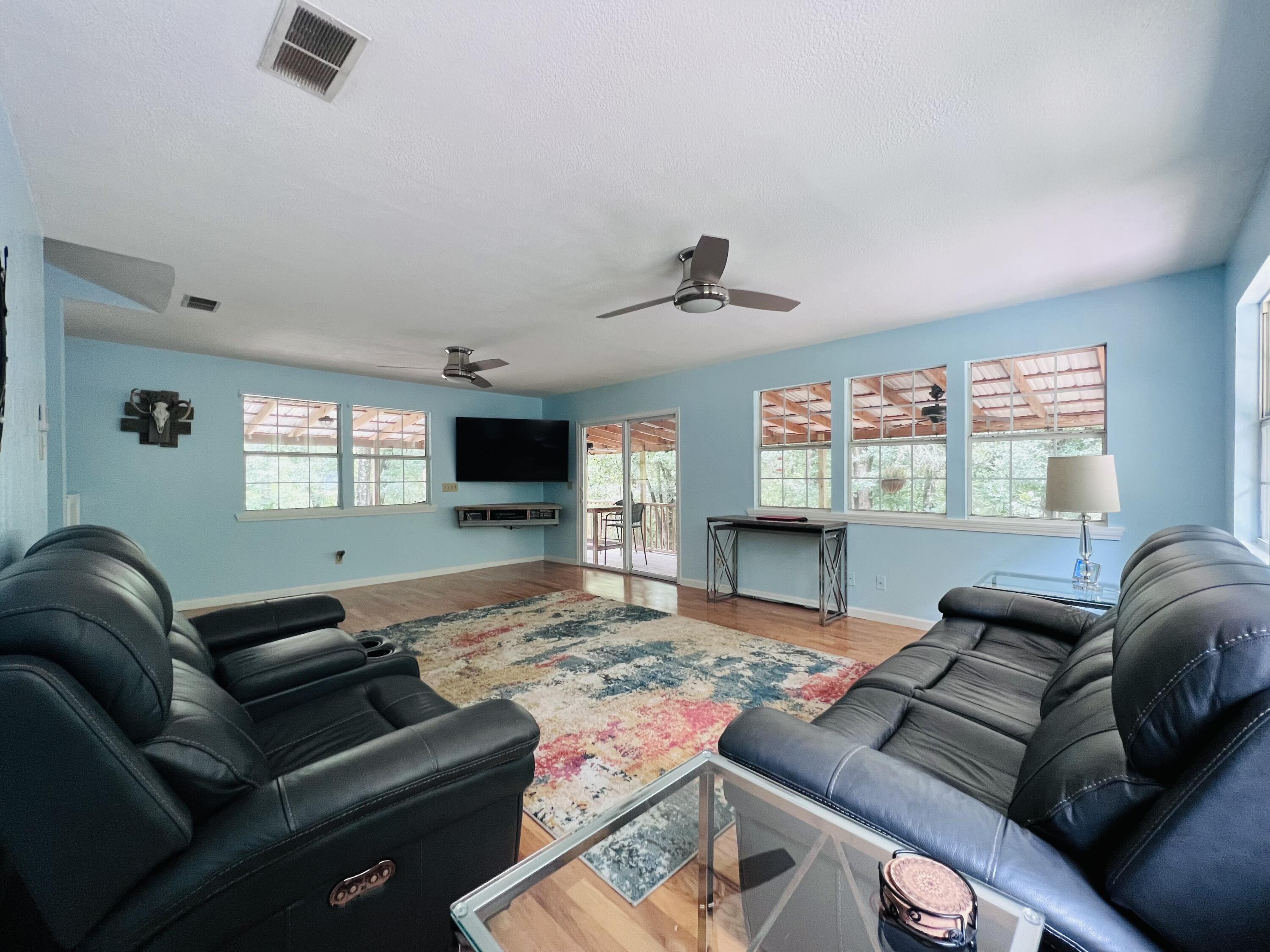 Xxxx Kervin Road Crestview, FL 32539 - Photo 35 of 78 a living room with furniture rug and window