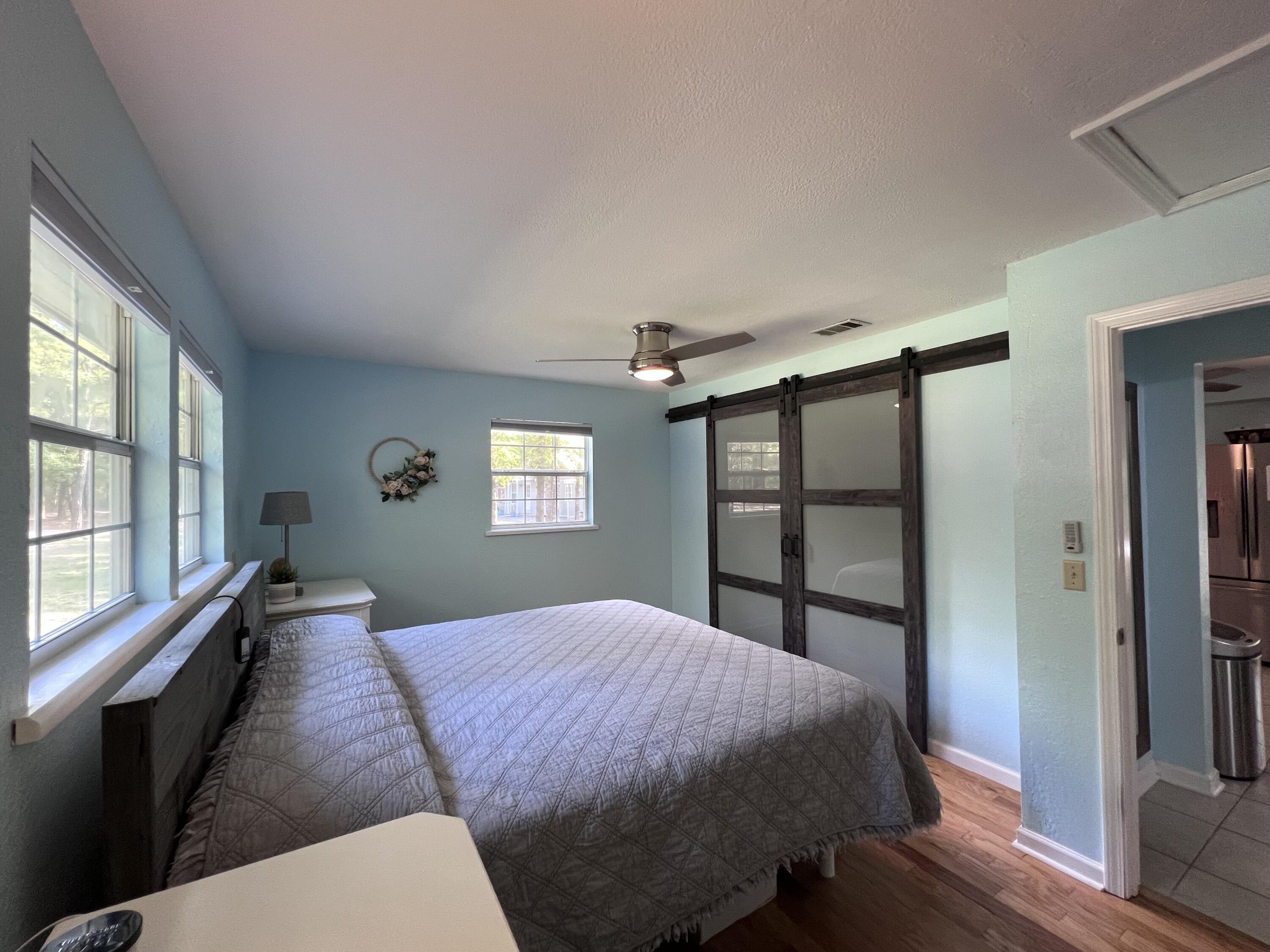 Xxxx Kervin Road Crestview, FL 32539 - Photo 42 of 78 a bedroom with a bed and a window