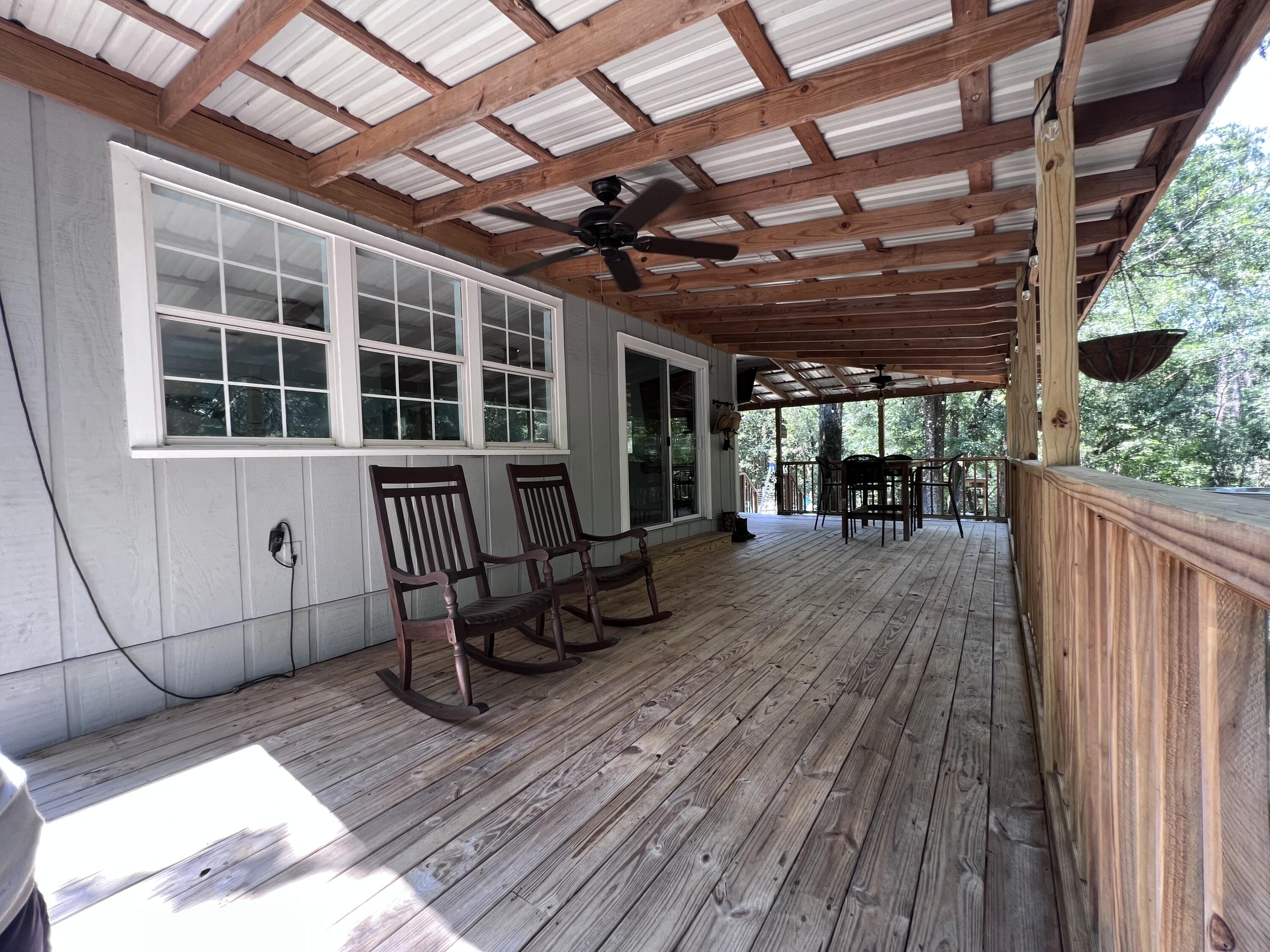 Xxxx Kervin Road Crestview, FL 32539 - Photo 51 of 78 a view of a backyard with sitting area