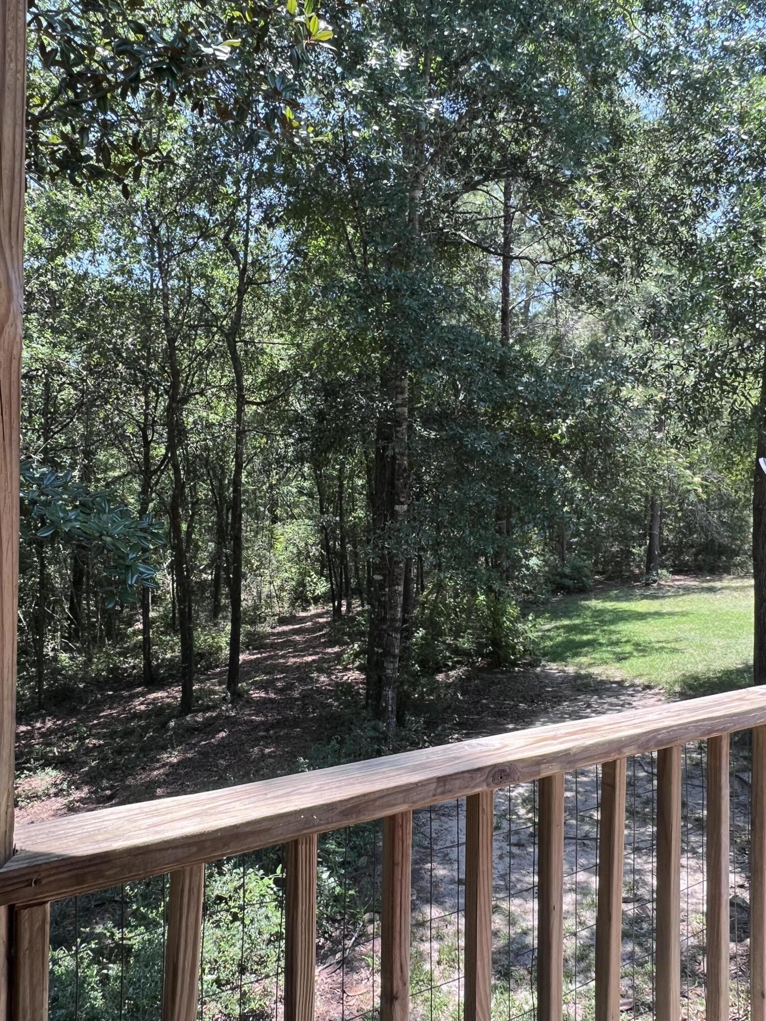 Xxxx Kervin Road Crestview, FL 32539 - Photo 56 of 78 a view of a yard with wooden fence