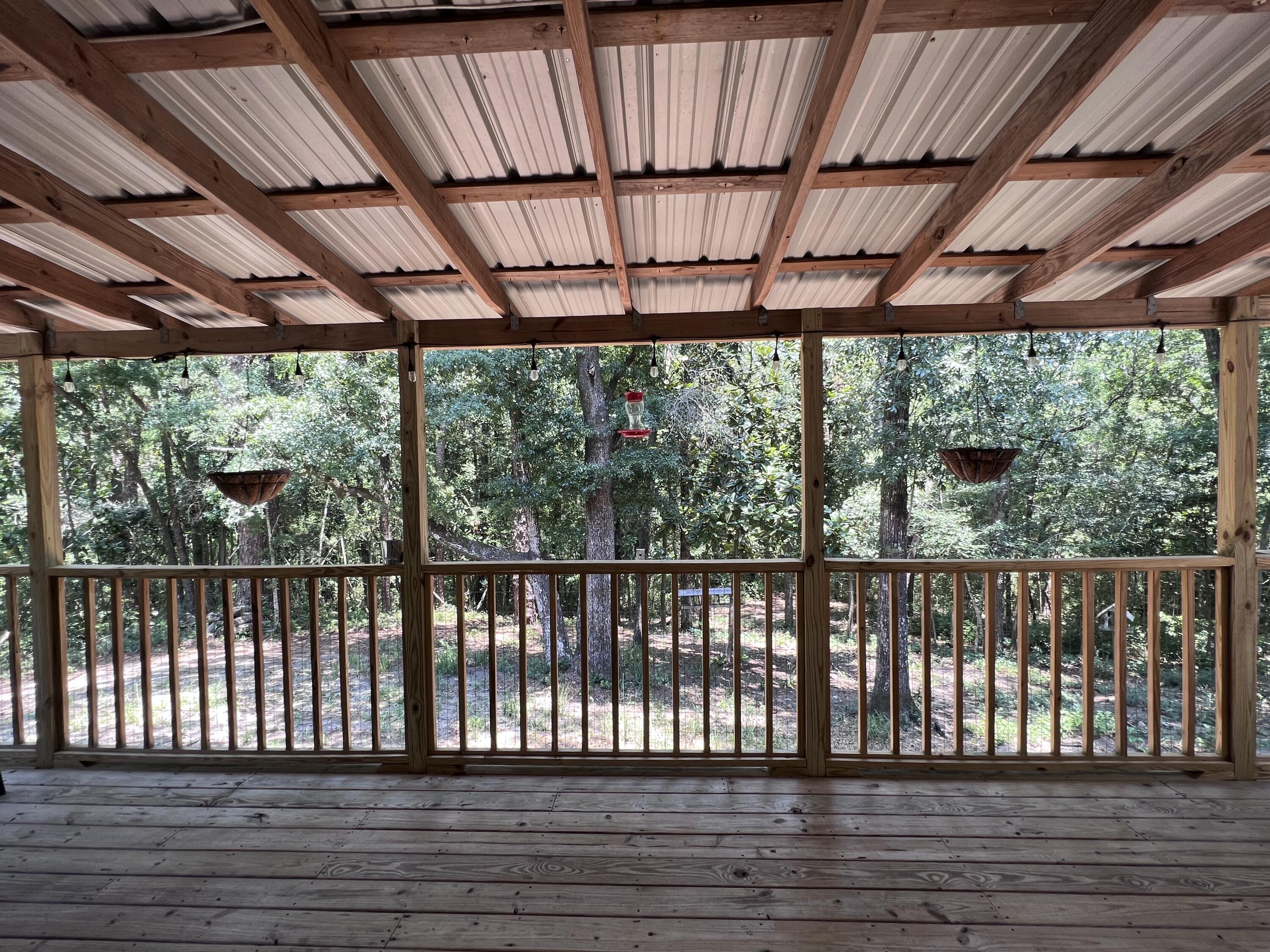 Xxxx Kervin Road Crestview, FL 32539 - Photo 57 of 78 a view of porch with furniture