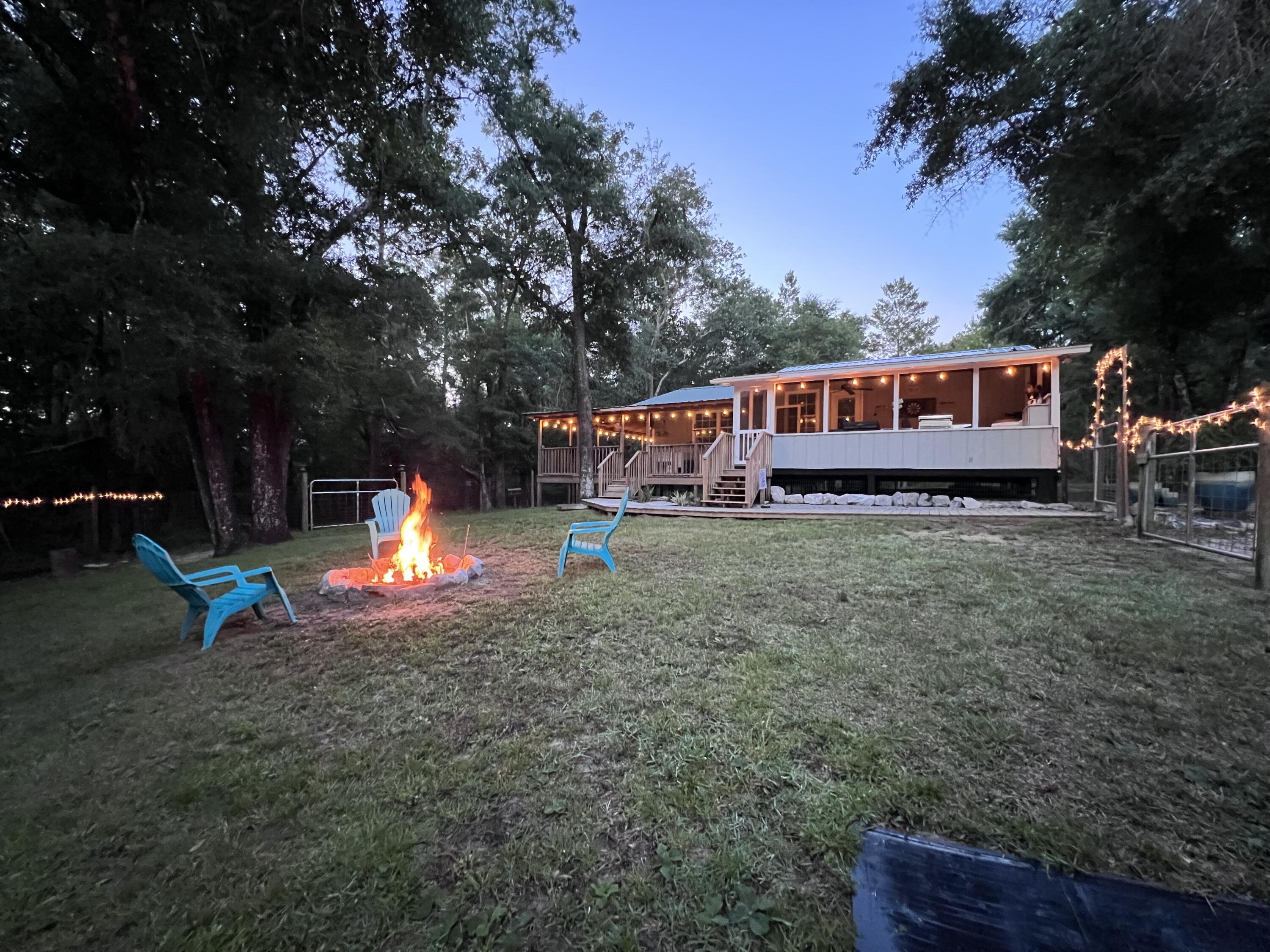 Xxxx Kervin Road Crestview, FL 32539 - Photo 63 of 78 a view of a house with a yard porch and sitting area