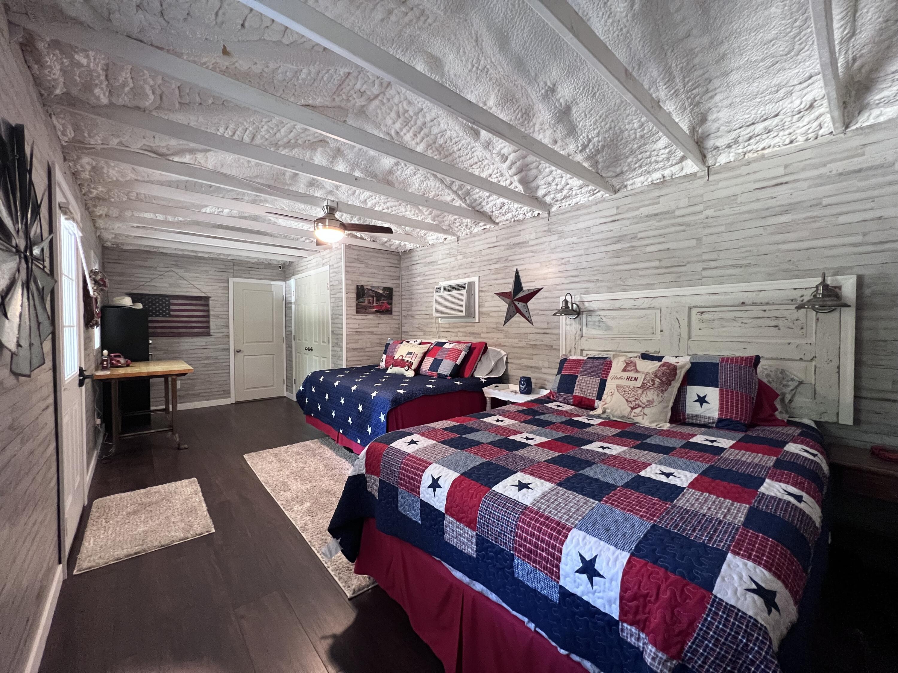 Xxxx Kervin Road Crestview, FL 32539 - Photo 69 of 78 a bed sitting in a bedroom next to a window