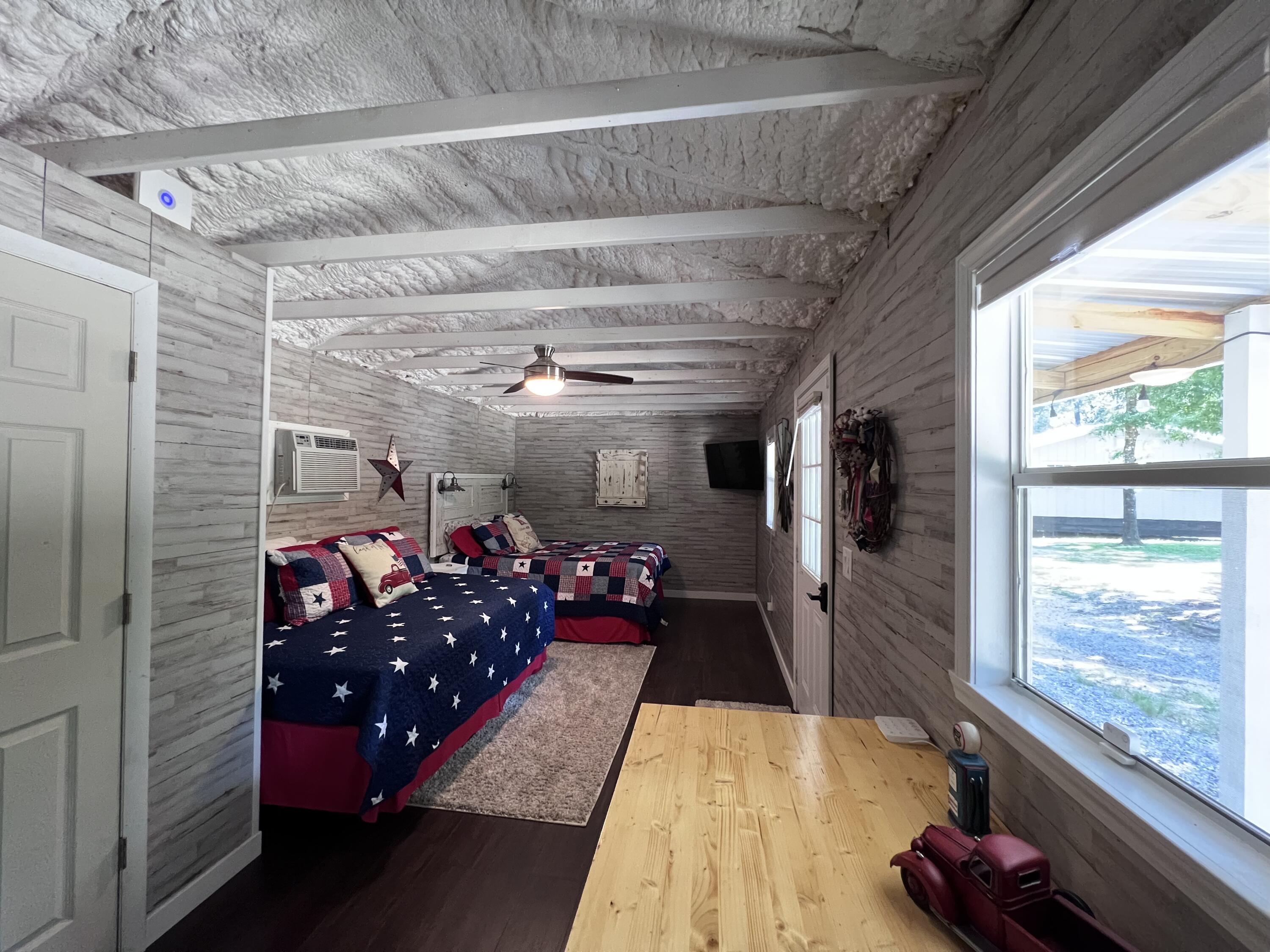 Xxxx Kervin Road Crestview, FL 32539 - Photo 71 of 78 a living room with lots of furniture and a chandelier