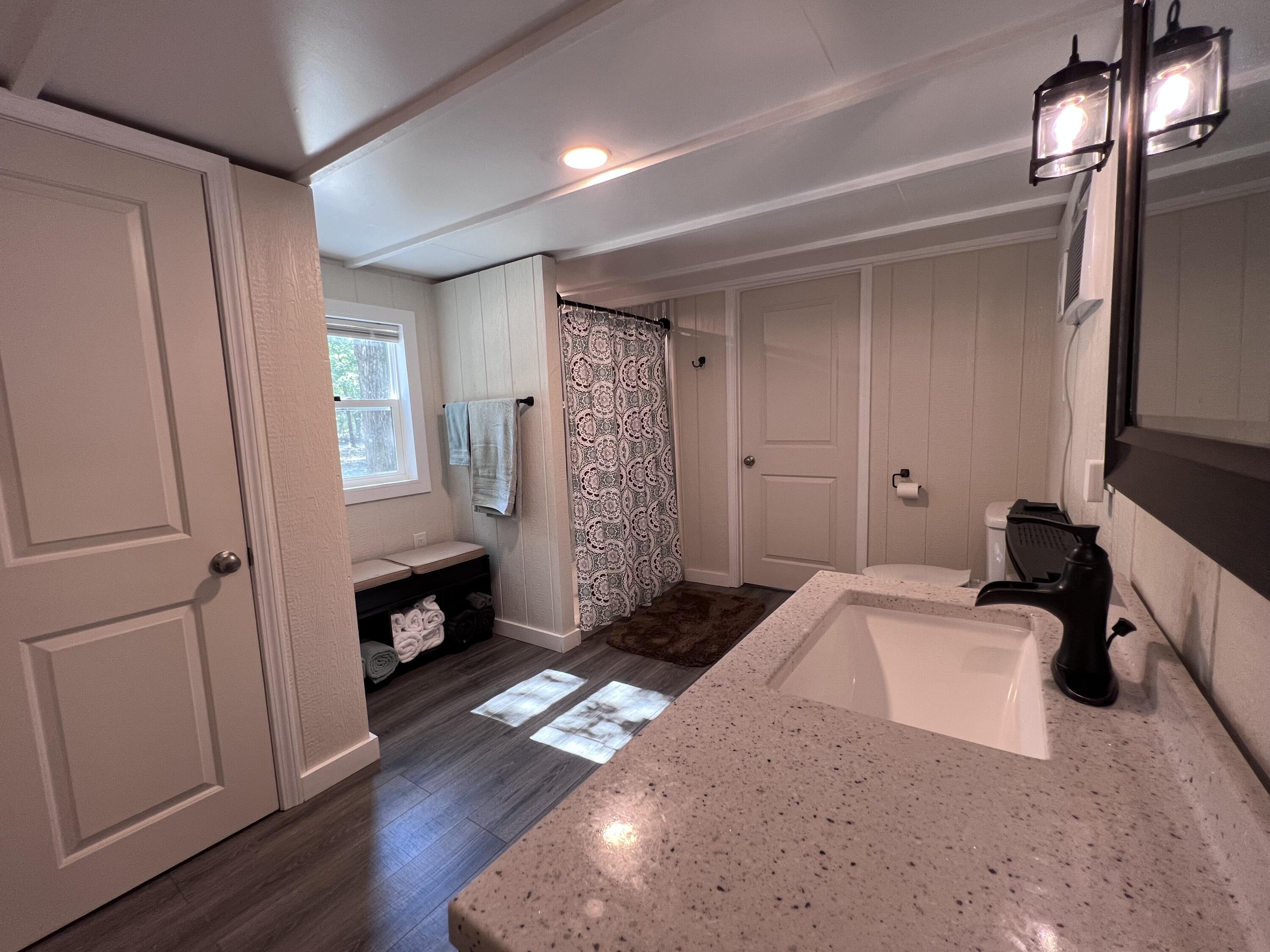 Xxxx Kervin Road Crestview, FL 32539 - Photo 72 of 78 a bedroom with a bed and a mirror on the dresser