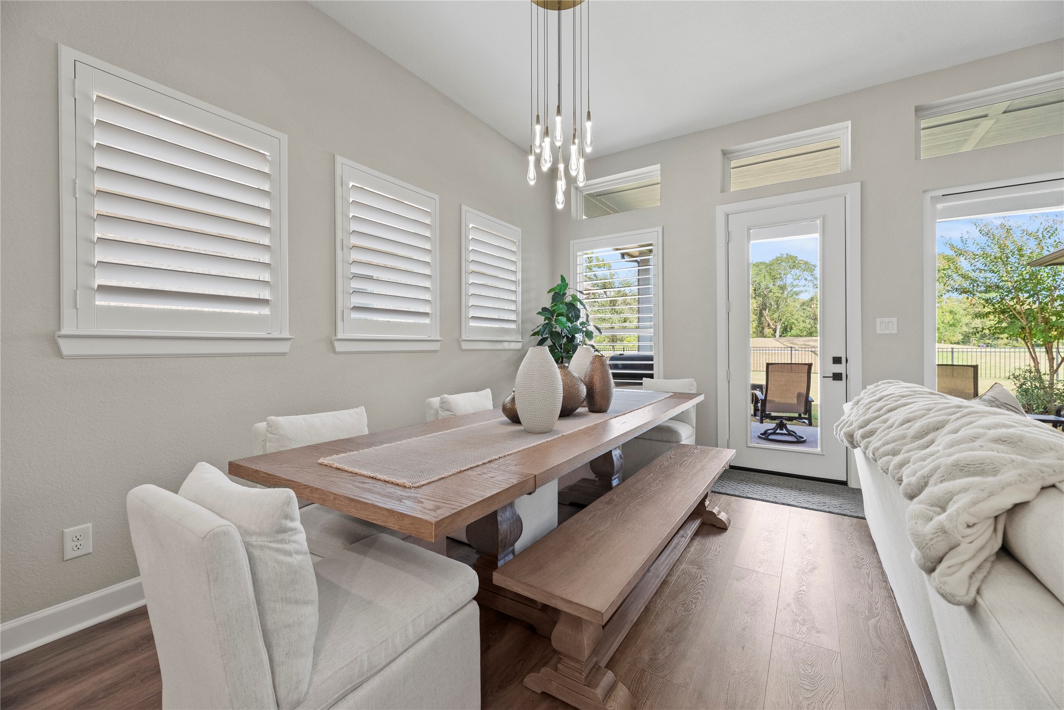 7543 Congress Trail Way Porter, TX 77365 - Photo 12 of 45 a living room with furniture and a chandelier