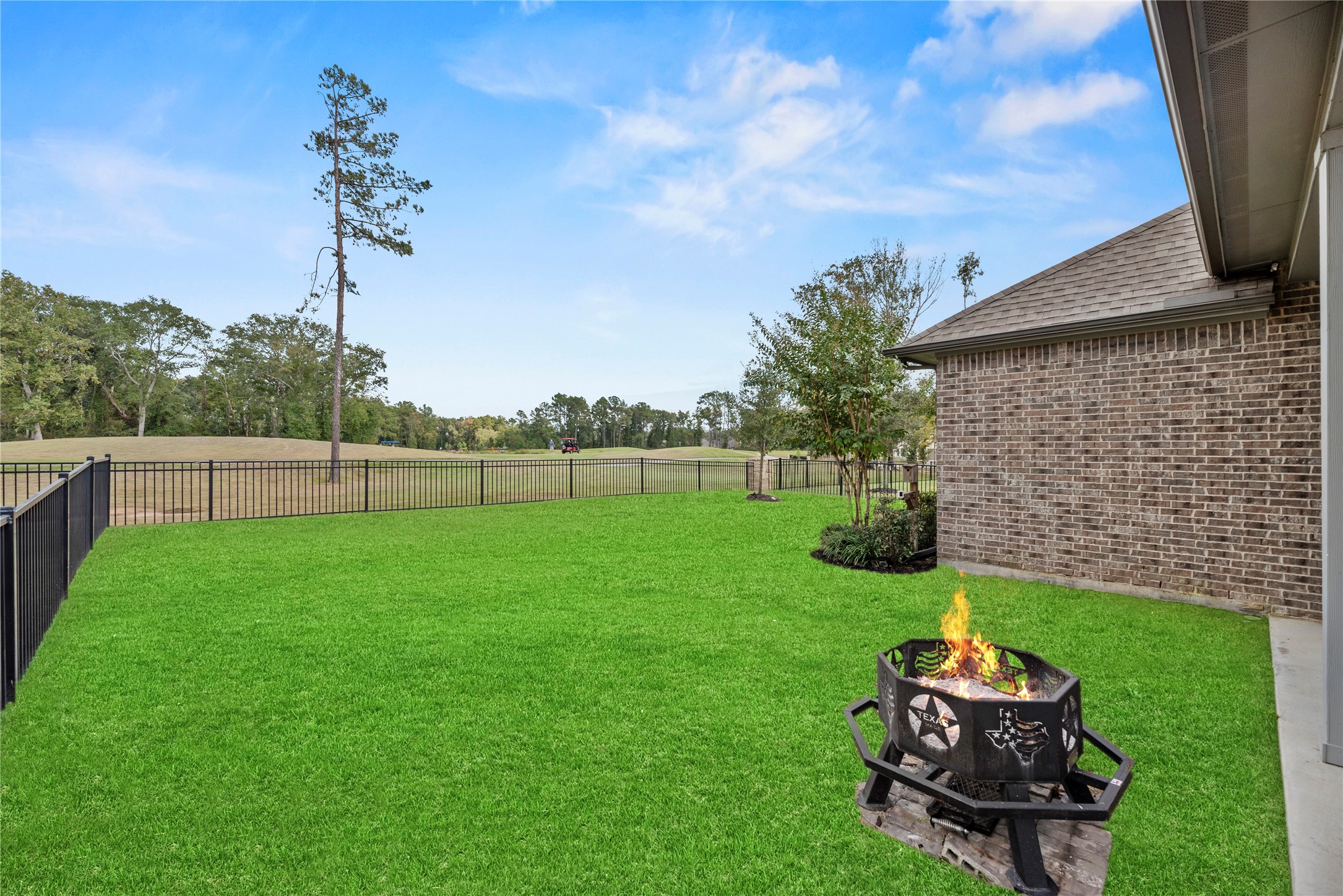 7543 Congress Trail Way Porter, TX 77365 - Photo 14 of 45 a backyard of a house with lots of green space