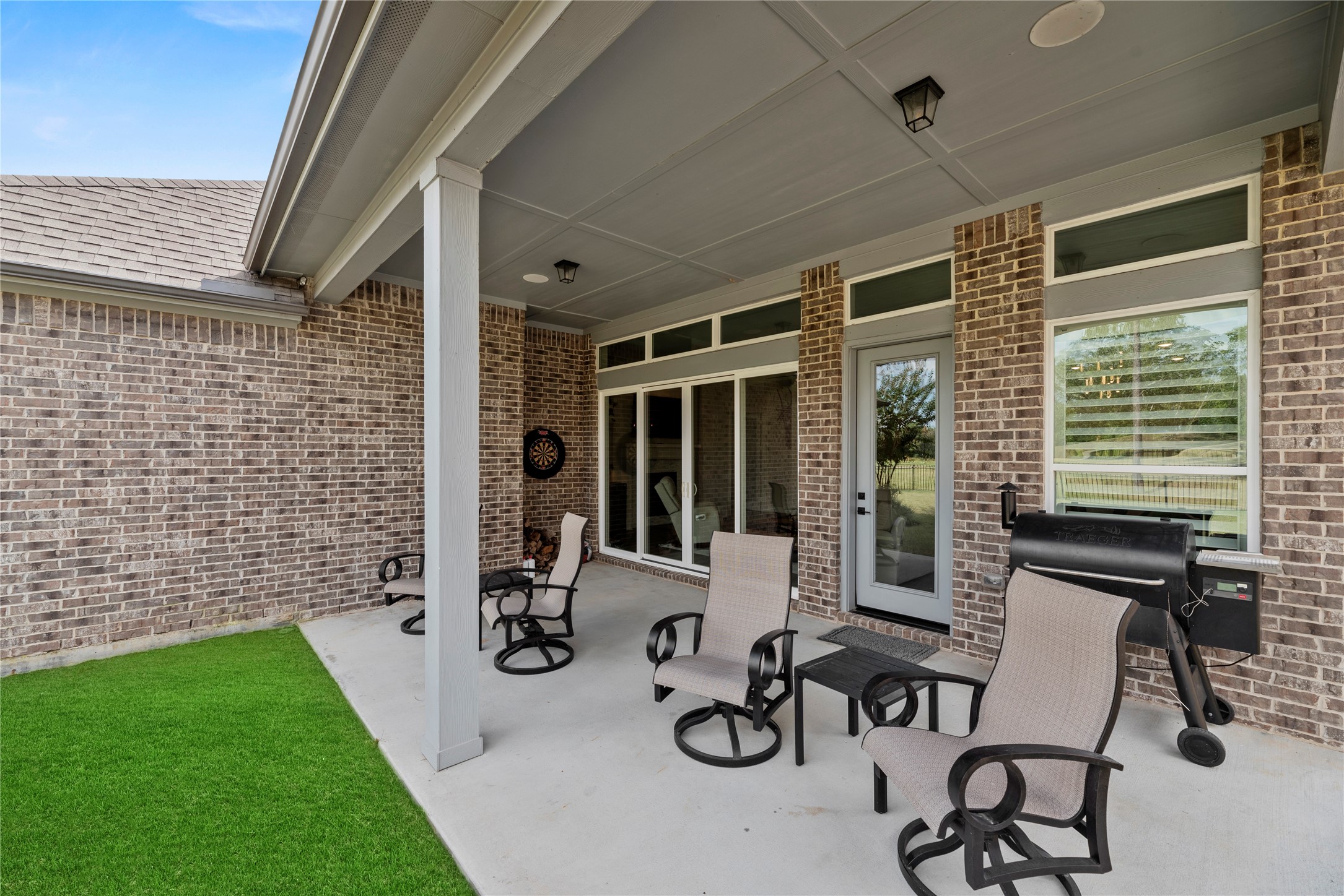 7543 Congress Trail Way Porter, TX 77365 - Photo 18 of 45 a view of a patio with chairs and table in a patio