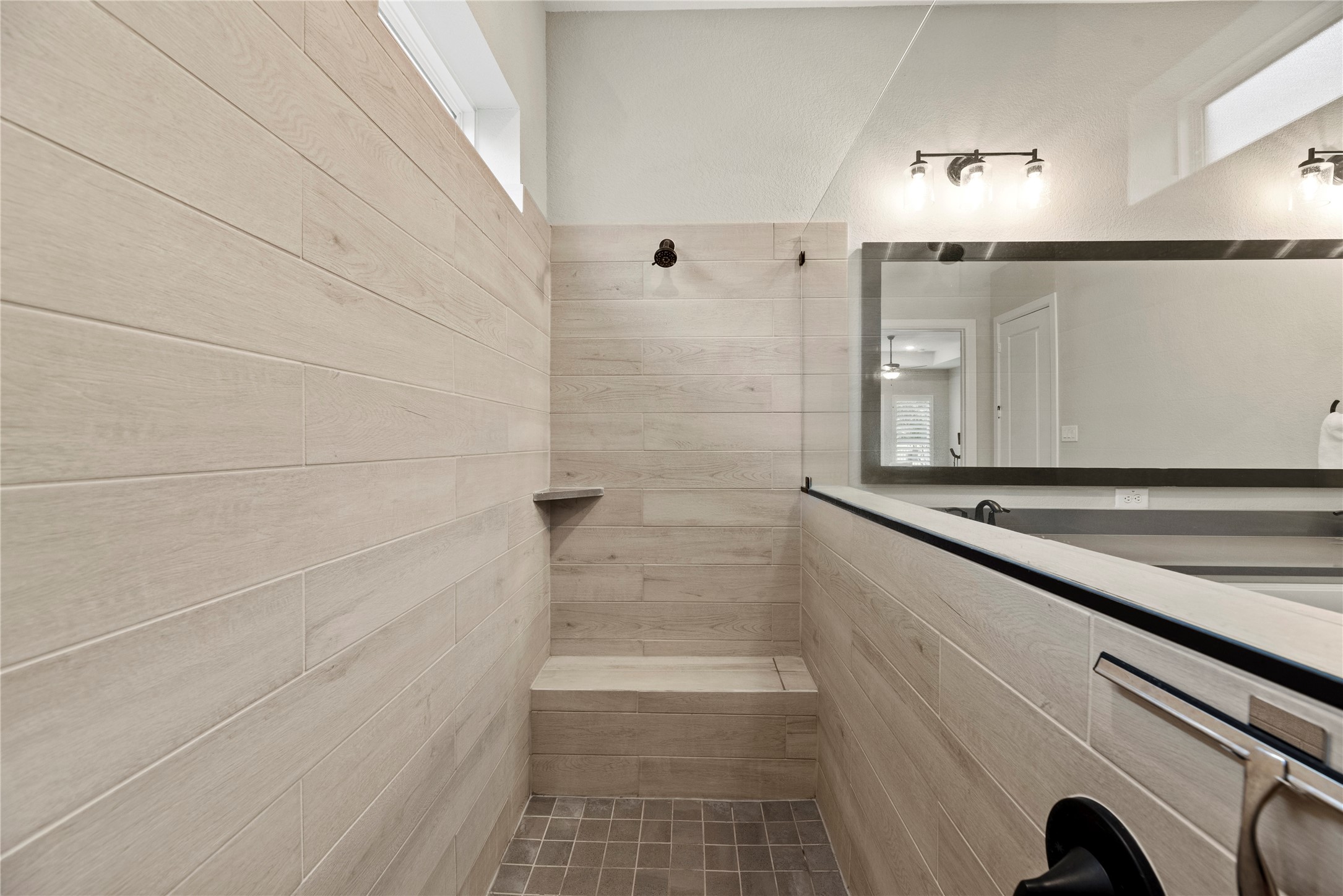 7543 Congress Trail Way Porter, TX 77365 - Photo 23 of 45 a bathroom with a shower and a sink