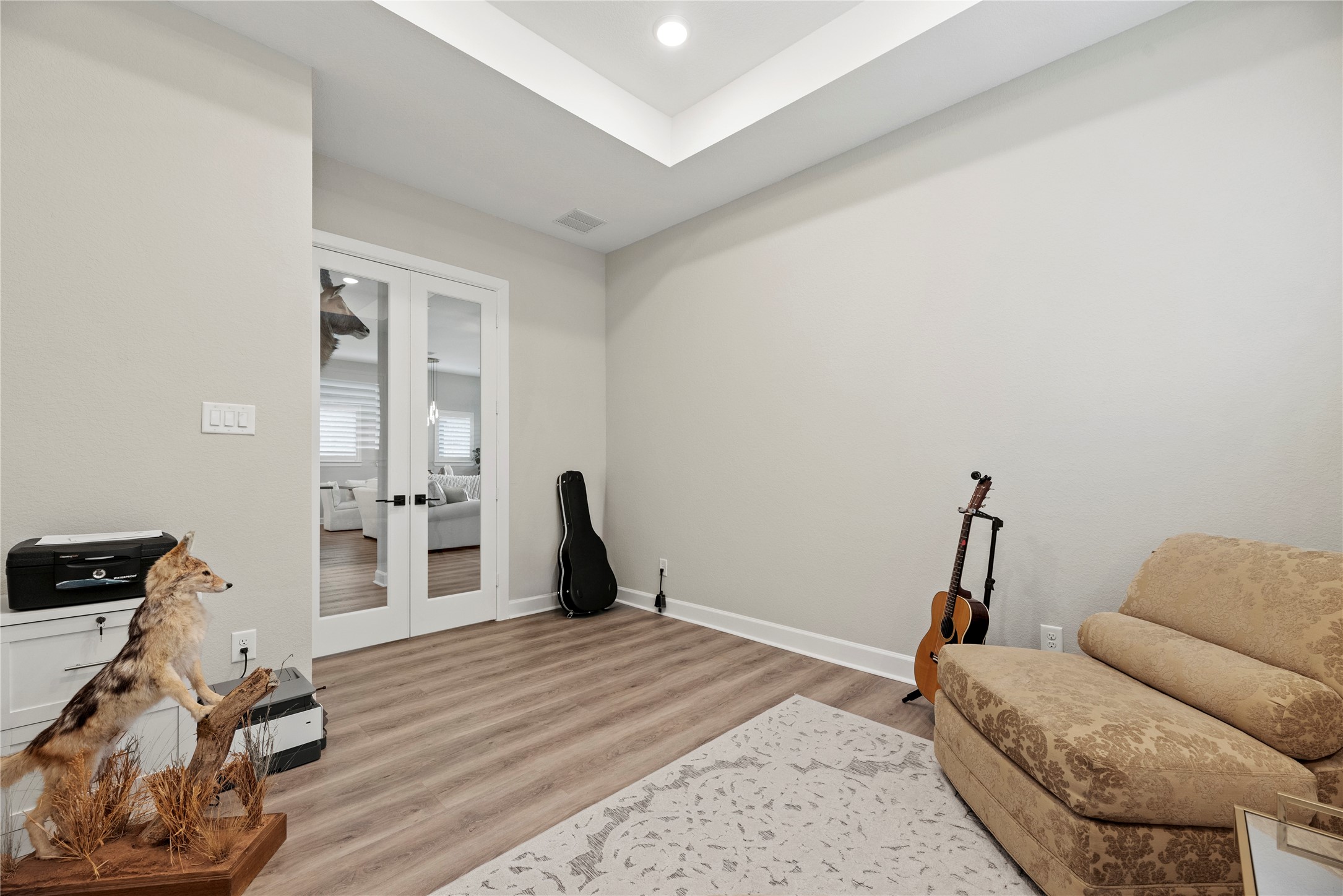 7543 Congress Trail Way Porter, TX 77365 - Photo 27 of 45 a bedroom with a bed and wooden floor