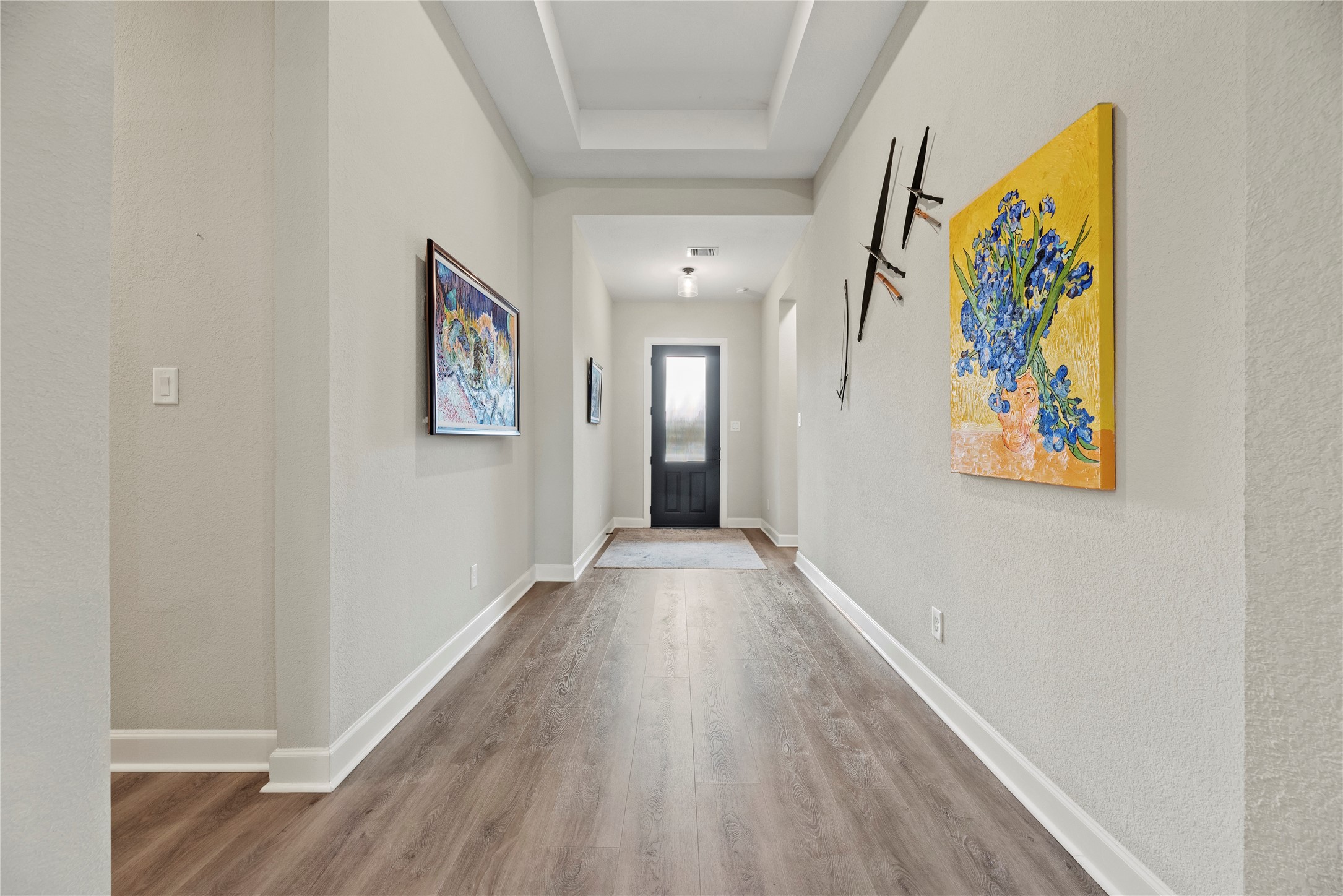 7543 Congress Trail Way Porter, TX 77365 - Photo 28 of 45 a view of an empty room with wooden floor