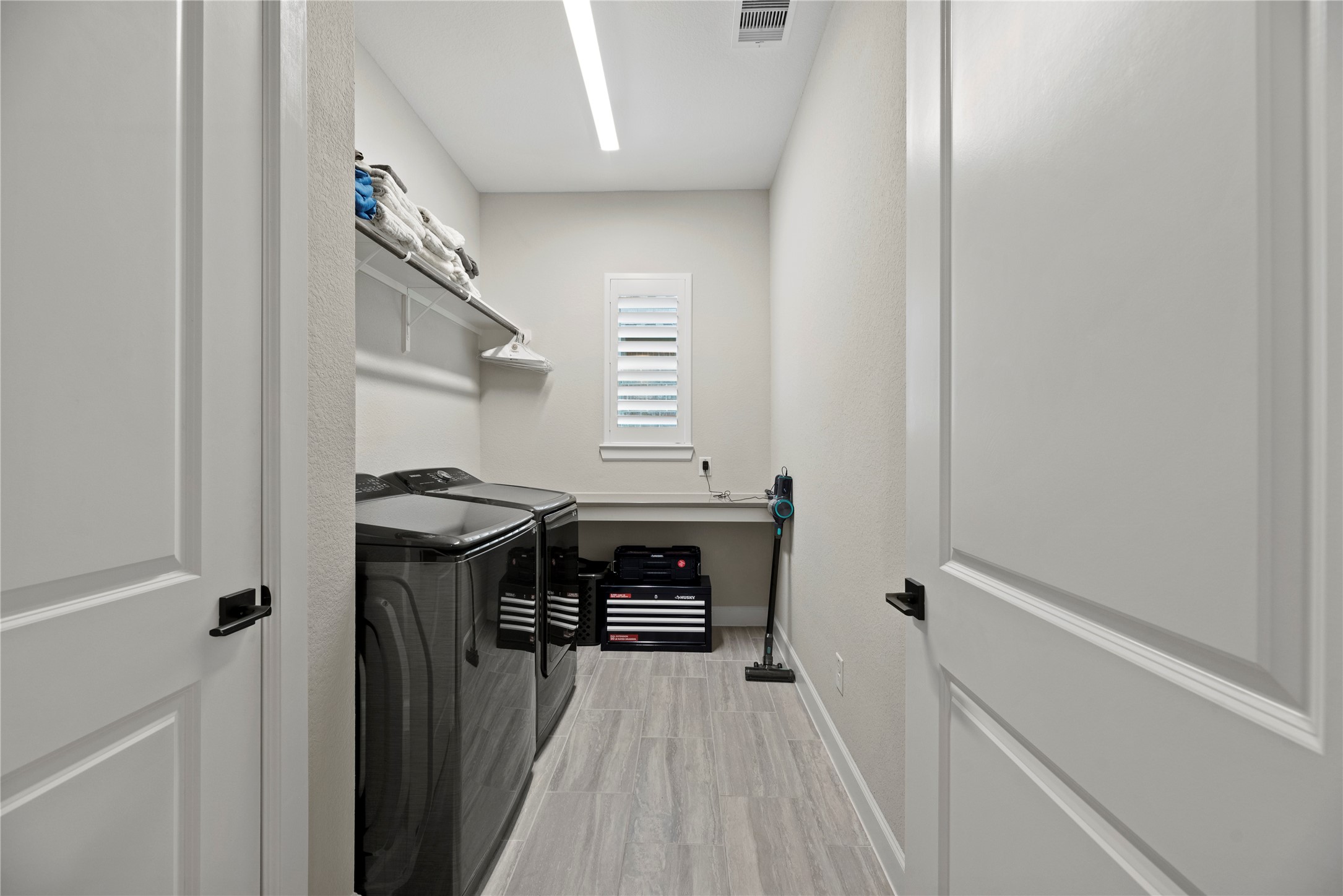 7543 Congress Trail Way Porter, TX 77365 - Photo 33 of 45 a view of kitchen and utility room