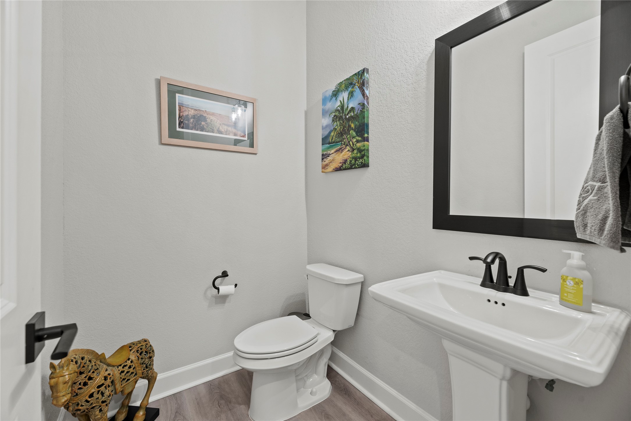 7543 Congress Trail Way Porter, TX 77365 - Photo 34 of 45 a bathroom with a sink mirror and toilet