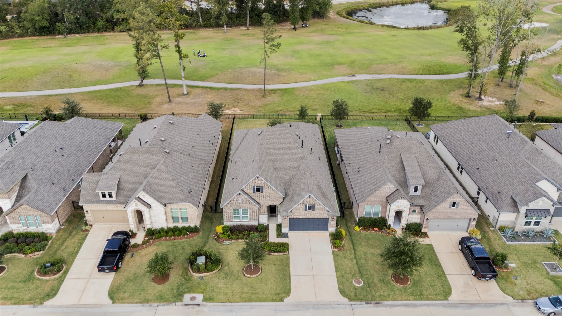 7543 Congress Trail Way Porter, TX 77365 - Photo 41 of 45 an aerial view of residential houses with outdoor space and ocean view