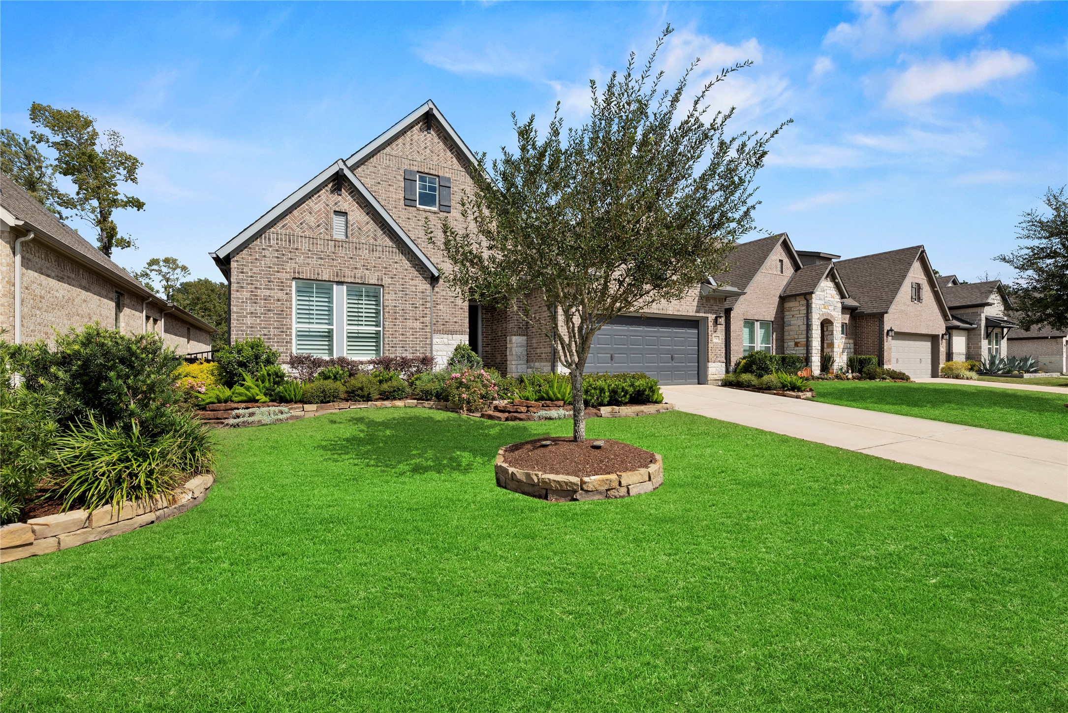 7543 Congress Trail Way Porter, TX 77365 - Photo 44 of 45 a front view of house with yard and green space