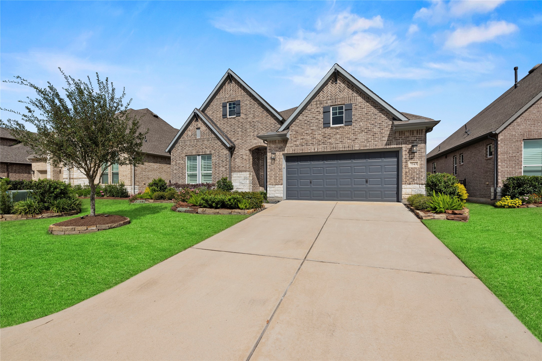 7543 Congress Trail Way Porter, TX 77365 - Photo 5 of 45 a front view of house with yard and green space