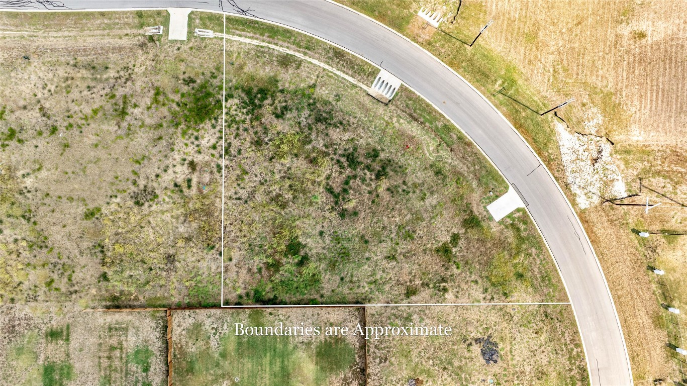 224 Altamira Avenue Elgin, TX 78621 - Photo 4 of 10 a view of a swimming pool with a yard