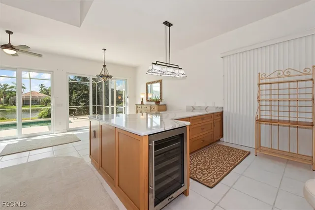 a kitchen with sink cabinets and window