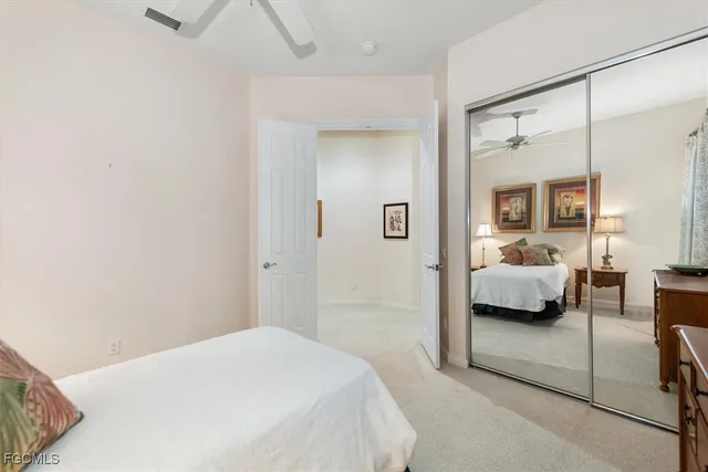 a bathroom with a sink toilet a mirror and shower