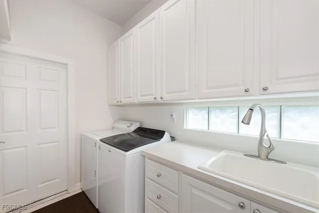 a view of a backyard with a patio and a yard