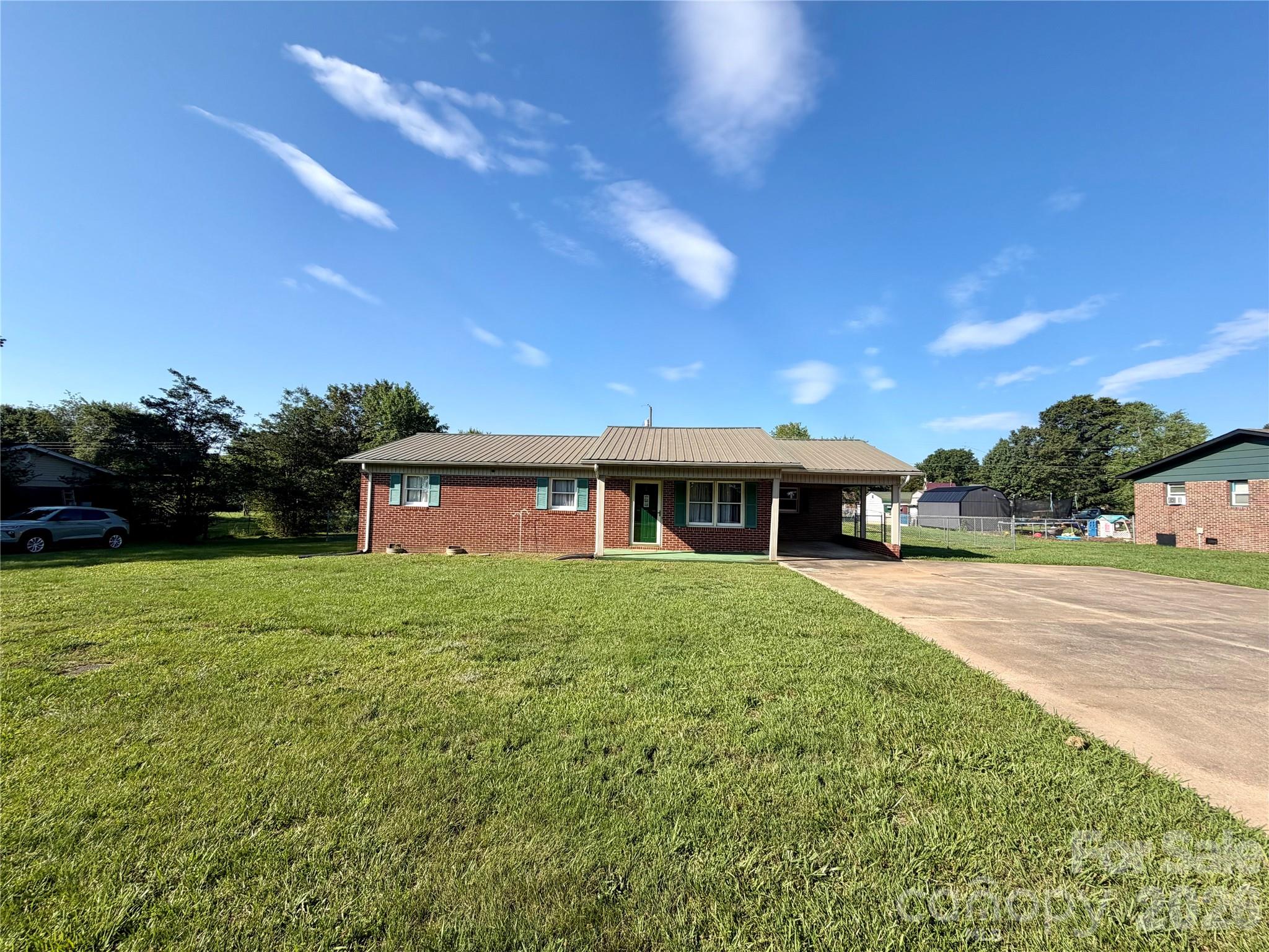 372 Ferry Road Forest City, NC 28043 - Photo 3 of 36 a view of a house with a big yard