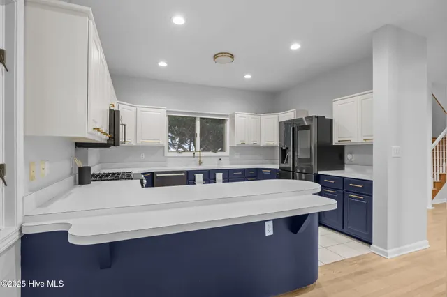 $910,000 | 518 Egret Lake Drive, Pine Knoll Shores, NC 28512