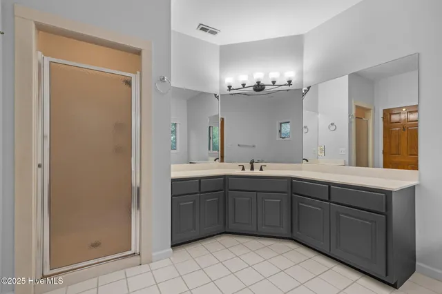 $910,000 | 518 Egret Lake Drive, Pine Knoll Shores, NC 28512