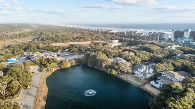 $910,000 | 518 Egret Lake Drive, Pine Knoll Shores, NC 28512