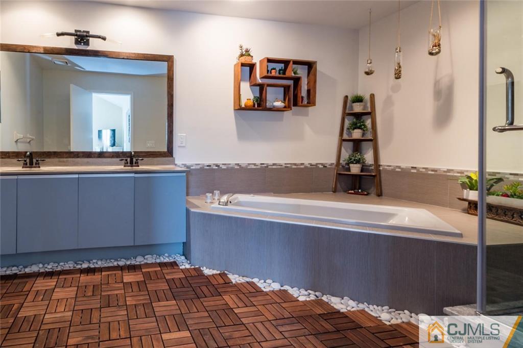191 Nebula Road, Unit 191 Piscataway, NJ 08854 - Photo 15 of 24 a bathroom with a bathtub and a sink