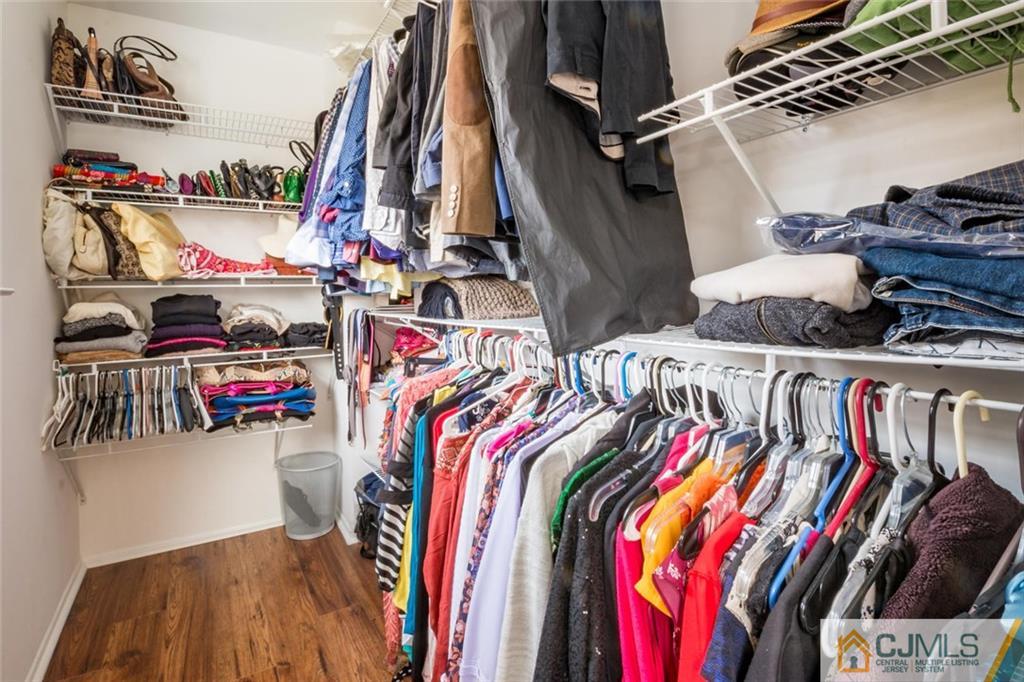 191 Nebula Road, Unit 191 Piscataway, NJ 08854 - Photo 16 of 24 a view of walk in closet with clothes and shoes