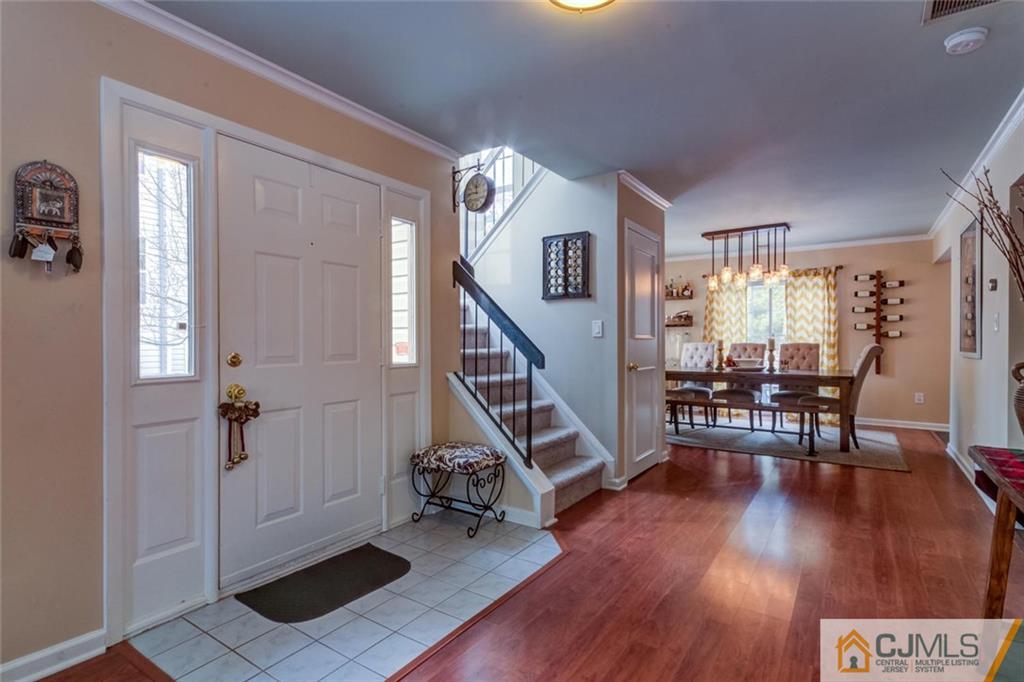 191 Nebula Road, Unit 191 Piscataway, NJ 08854 - Photo 20 of 24 a view of a livingroom with furniture and hardwood floor