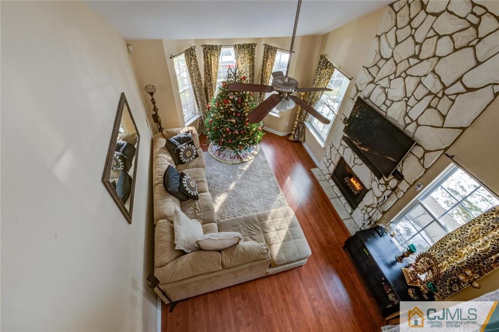 191 Nebula Road, Unit 191 Piscataway, NJ 08854 - Photo 3 of 24 a view of living room with furniture and a flat screen tv
