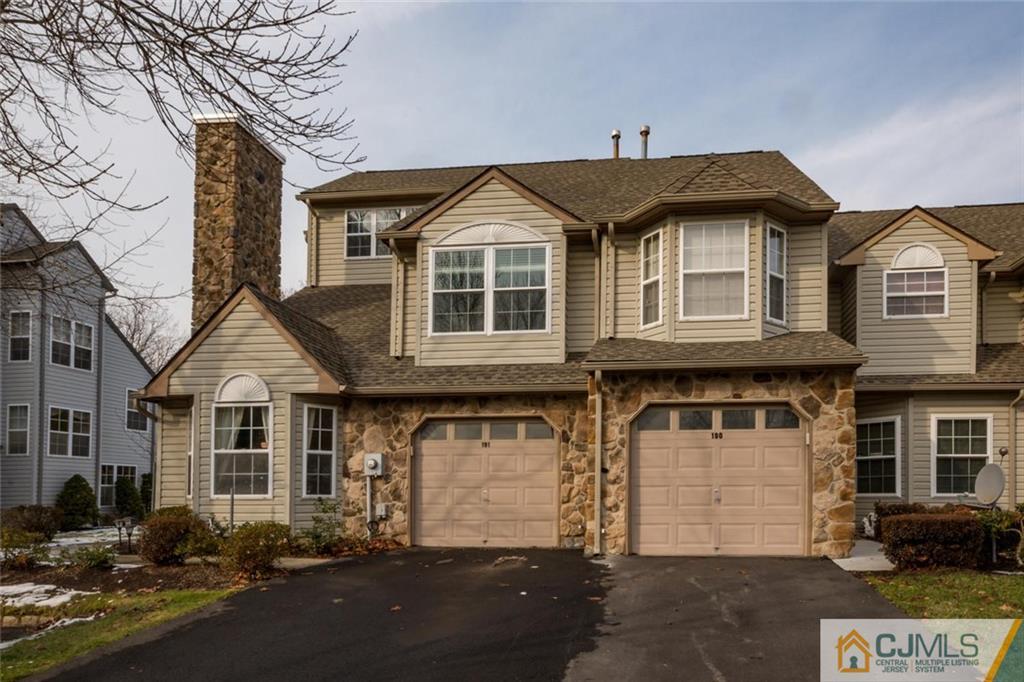 191 Nebula Road, Unit 191 Piscataway, NJ 08854 - Photo 22 of 24 a front view of a house with a yard